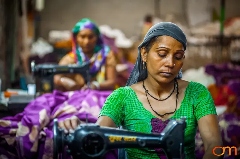 Women Sewing Garments in India