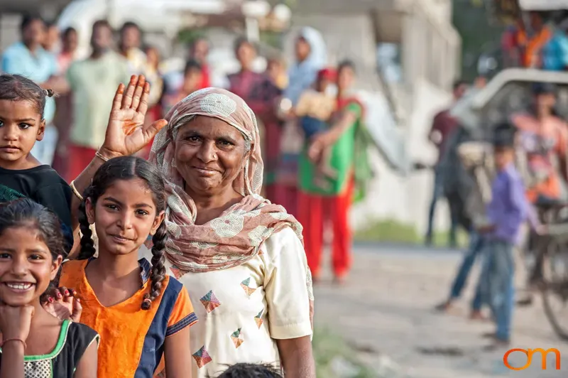 Woman and Children Waving in Punjab, India