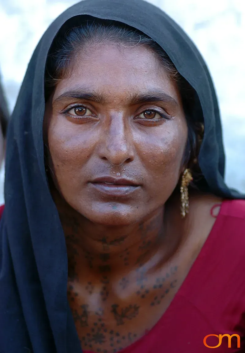 Portrait of Woman With Traditional Neck Tattoos in Gujarat